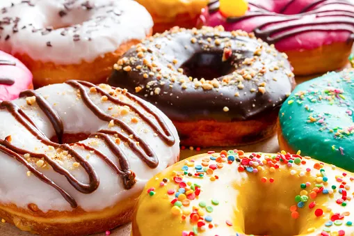 donuts in multicolored glaze close up
