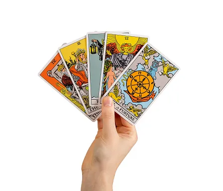 hand holding tarot cards major arcana isolated on white background