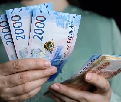 russian rubles in female hands cash pay salary inflation or savings concept